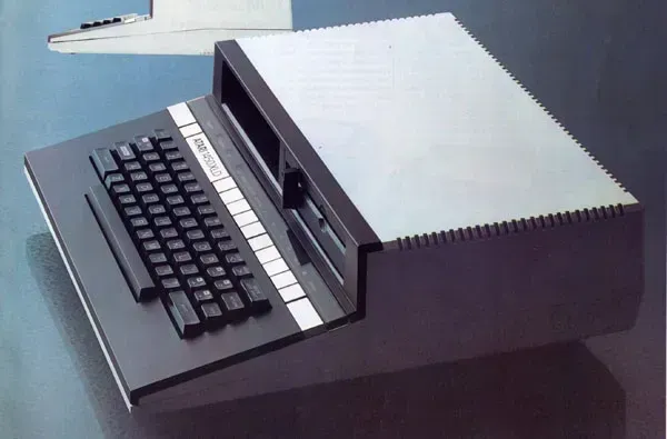 A prototype Atari 1450XLD. Like the systems that shipped, it is in black and chrome, but is taller than the other units, featuring a kind of shelf into which two 5 1/4" floppy drives can be inserted.