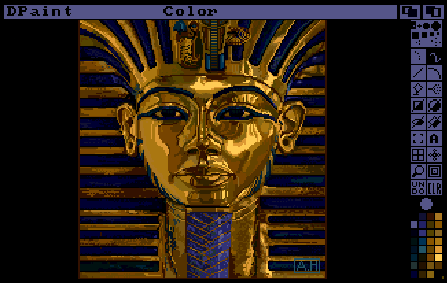 The interface for Deluxe Paint III, featuring the famous pixel art rendition of the golden, bejeweled King Tutenkhamen death mask.