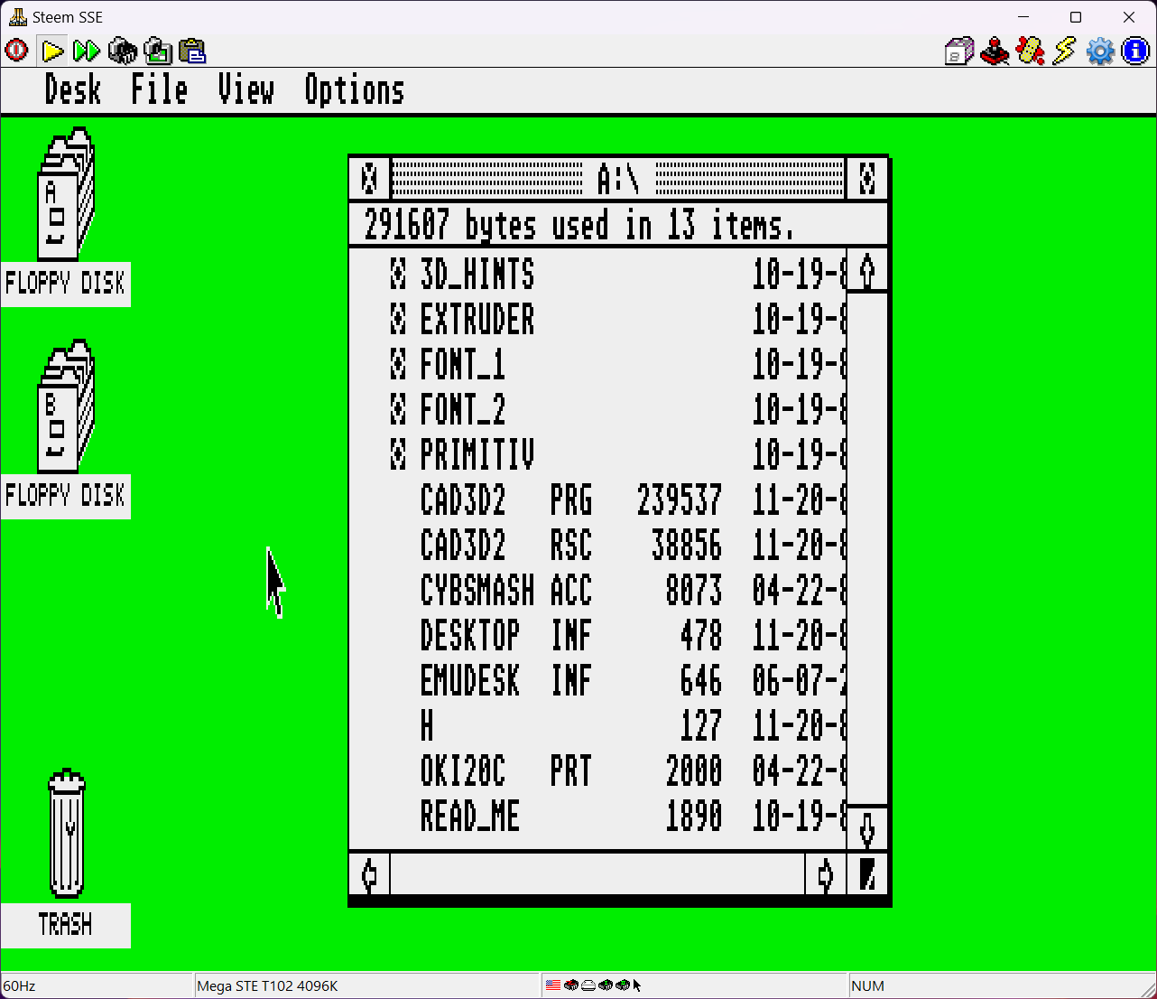 Bog standard screenshot of the GEM desktop user interface. Bright green background with all UI elements in black and white. The icons for the disks, pointer, and trashcan have a tall, thin look giving a first impression that the monitor has been set incorrectly.