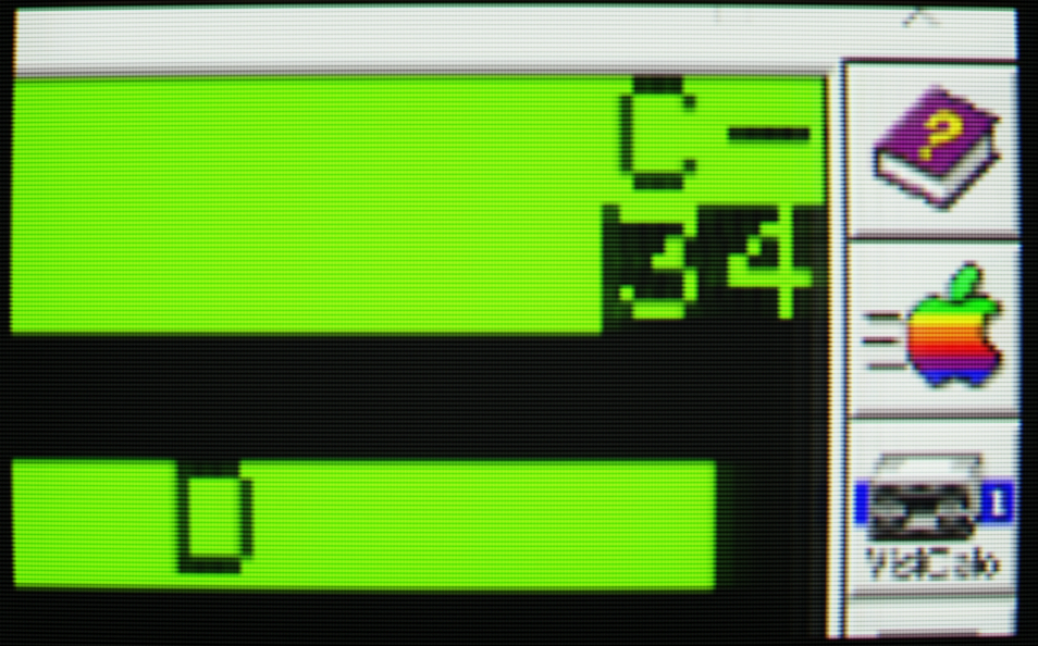 Zoomed in screenshot of the AppleWin interface showing the upper right corner of the VisiCalc display. It reads "C dash 34"