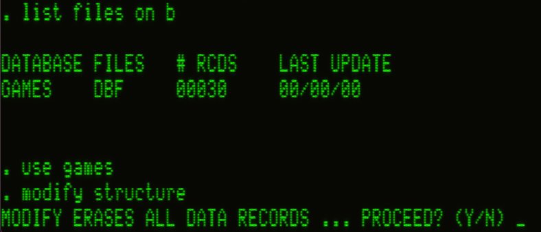 dBASE being told to "modify structure" to which is responds, "Modify erases all data records ... proceed? (Y/N)"