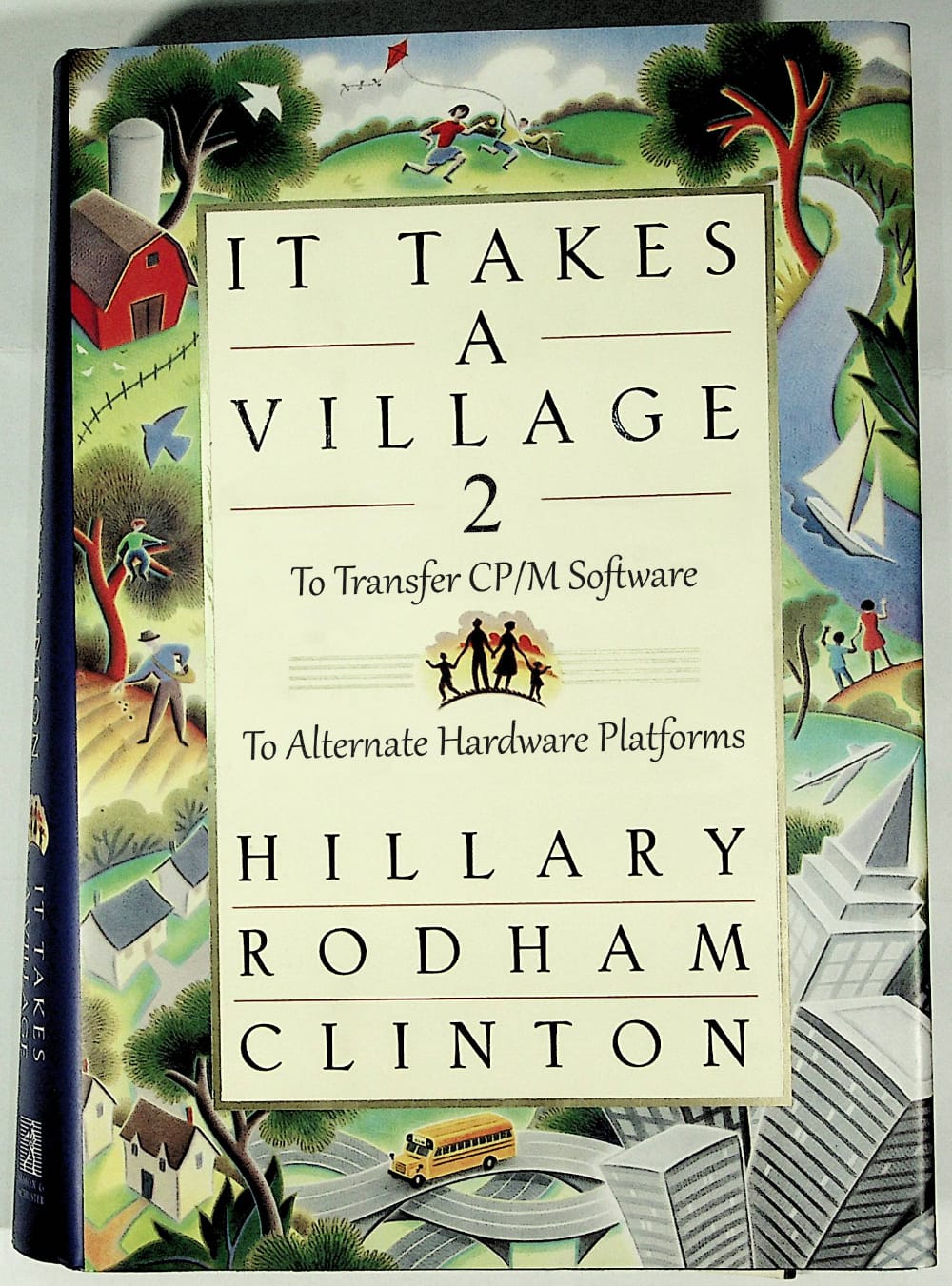 A photoshop visual gag. Hillary Clinton's book "It Takes a Village" has been modified to read, "It Takes a Village 2: Transfer CP/M Software To Alternate Hardware Platforms"
